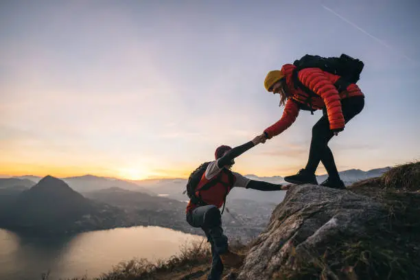 Traveler reaching the summit