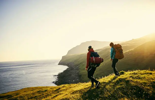 Hiker on a coastal cliff